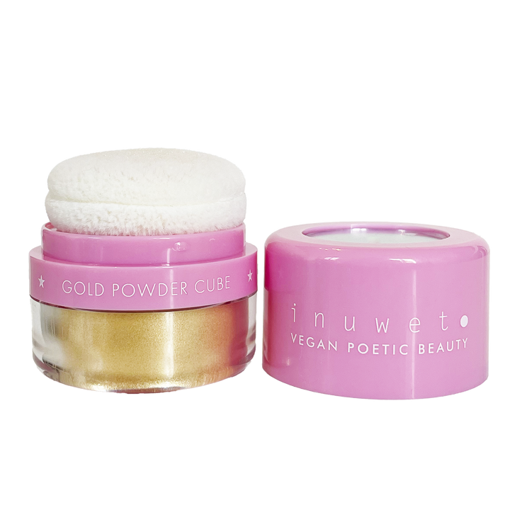 Cubitos de polvos dorados brillantes de maquillaje con espejo