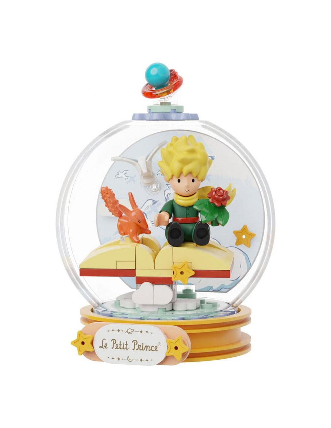 Maqueta de construcción : El Principito sentado en un libro