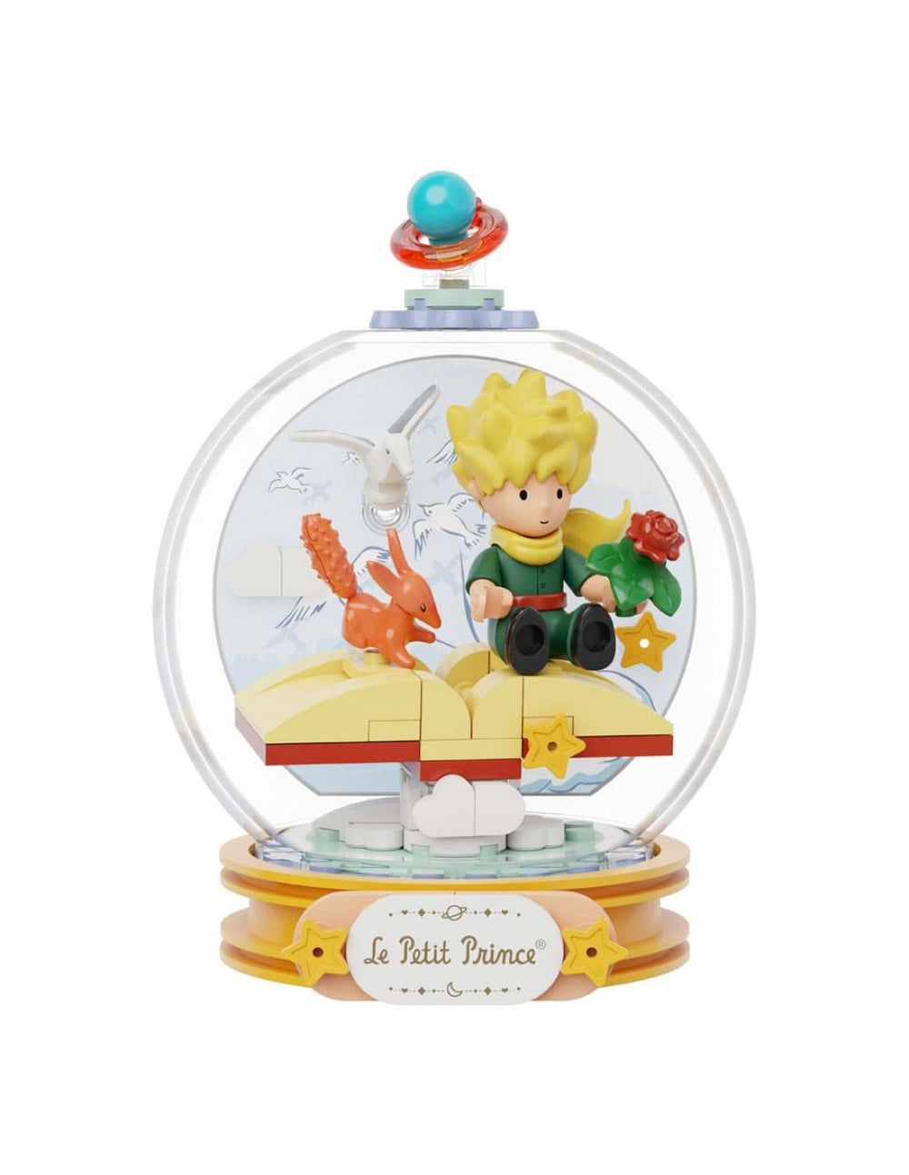 Maqueta de construcción : El Principito sentado en un libro