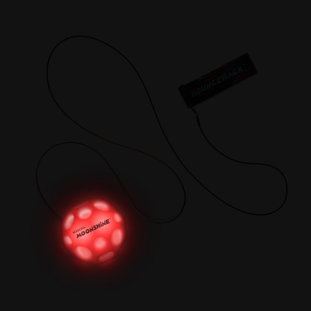 Pelota con cuerda elástica para muñeca para muñeca LED (2 colores surtidos)